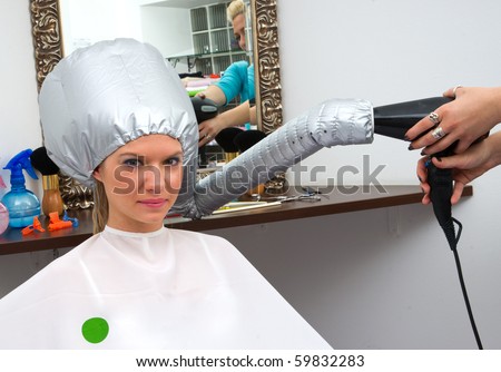 woman with soft bonnet hair dryer on her head