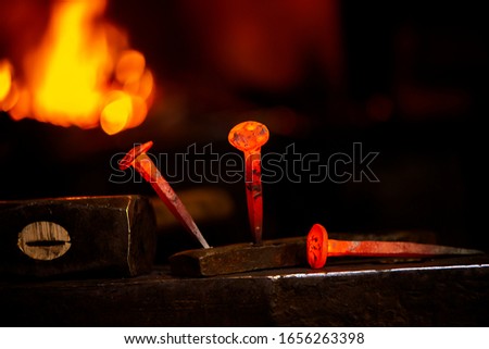 Similar – Image, Stock Photo Close-up hot metal nail on an anvil in blacksmith’s workshop