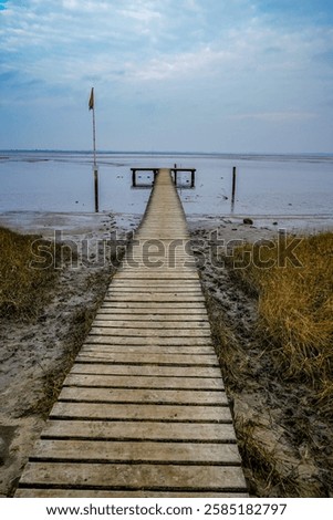 Similar – Image, Stock Photo Low tide. Mudflat. Cloud.