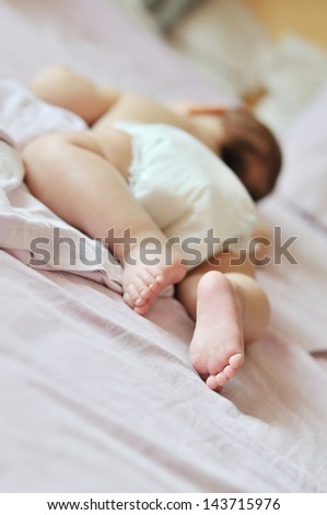 sweet dreams of newborn on the tummy