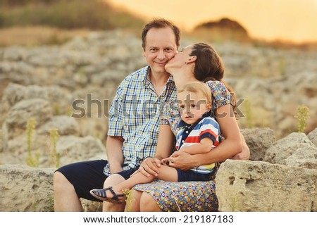 family in sunset  time outdoors