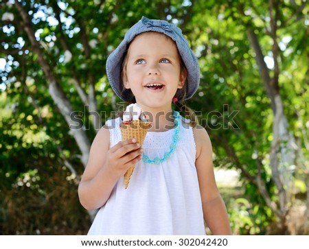 happy child with big ice cream cone