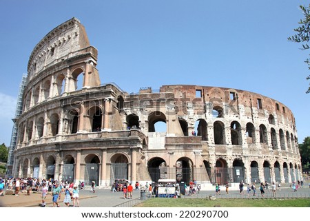 ROME - JULY 19: Coliseum exterior on July 19, 2014 in Rome, Italy. The Coliseum is one of Rome's most popular tourist attractions with over 5 million visitors per year.