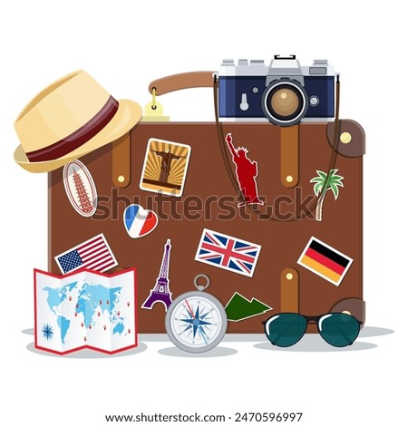 Vintage old travel suitcase. Leather retro bag with stickers. Hat, photo camera, eyeglasses, paper map, compass. Labels of places all over the world. Vacation, travel. Vector illustration flat style