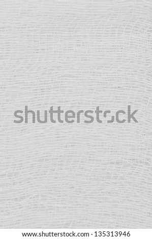 White medical bandage gauze texture, abstract textured background macro closeup, natural cotton linen fabric, vertical copy space pattern