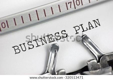 Typewriter detailed macro closeup typing text Business Plan, large vintage metaphor, success, analysis, marketing, strategy, financial, market growth planning objectives management concept, horizontal