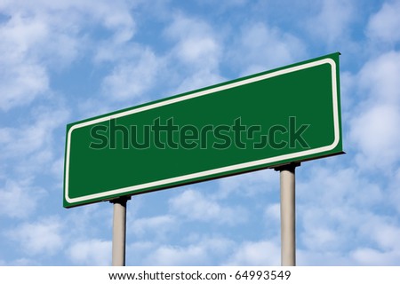 Blank Green Road Sign Against Light Cloudscape, Summer Sky And Clouds