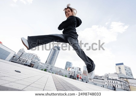 Similar – Image, Stock Photo Stylish dancer dancing in corner of studio