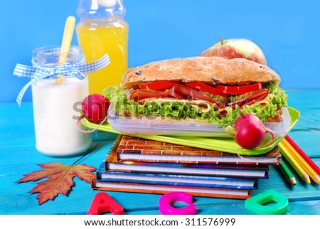 healthy breakfast for school  with big ciabatta sandwich ,fresh fruits and drink