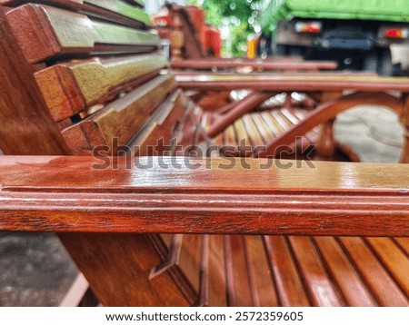 Similar – Image, Stock Photo Artisan polishing wooden detail using sandpaper in carpentry workshop