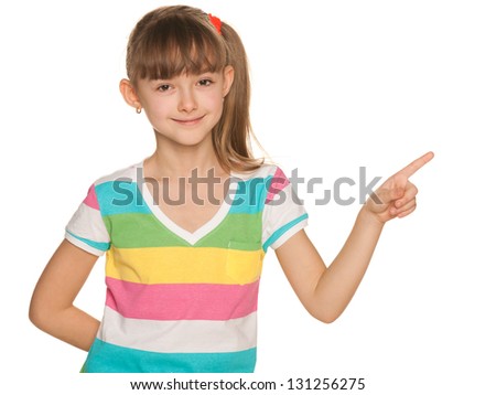 A portrait of a pretty girl in striped blouse makes a hand gesture