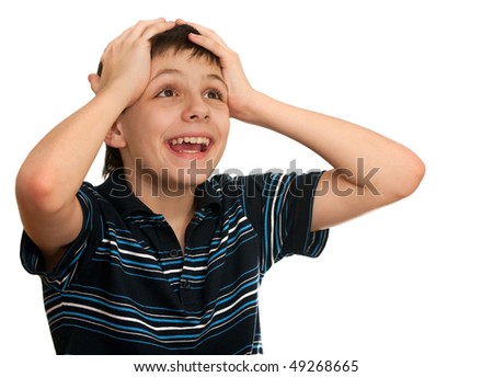 A Shocked Kid Is Holding His Hands At The Head; Isolated On The White ...