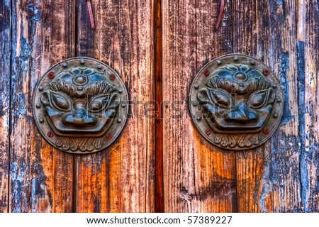 Old metal door knob with animal pattern in China