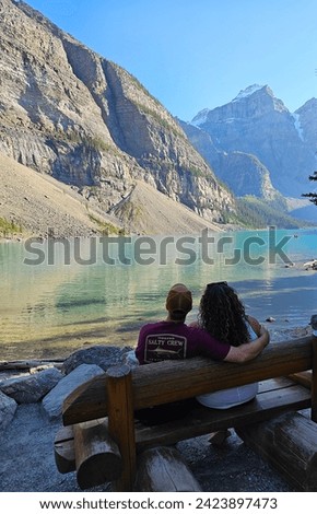 Similar – Image, Stock Photo Traveling couple admiring breathtaking landscape of bay in summer