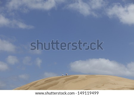 People on the Te Paki Sand dunes, The Te Paki Sand dunes are in the top end of Northland, New Zealand.