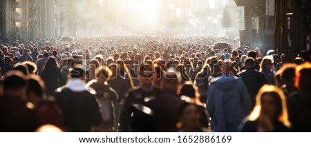 Photo of Blurred crowd of unrecognizable at the street