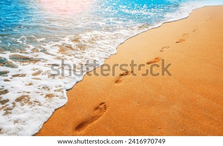 Similar – Foto Bild Fußabdrücke an einem Strand