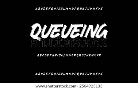 Isolated typeface on a black backdrop. Alphabet texture in graffiti and street art styles. Grunge and an unclean look. Brush lettering in vector format.