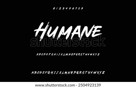 Isolated typeface on a black backdrop. Alphabet texture in graffiti and street art styles. Grunge and an unclean look. Brush lettering in vector format.