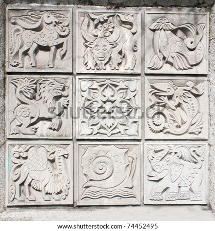 bas-reliefs of animals near the city zoo