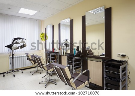 Barbershop room with three working places in the beauty salon