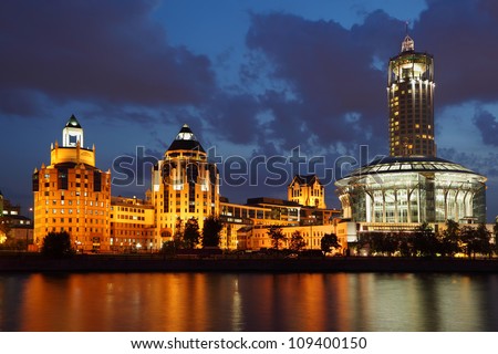 Office complex on Shluzovaya waterfront (River House) and House of Music at night in Moscow, Russia.