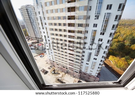 MOSCOW - OCTOBER 7: View from window on buildings of residential complex Elk Island on October 7, 2011 in Moscow, Russia. Residential complex Elk Island is being built near to national park.