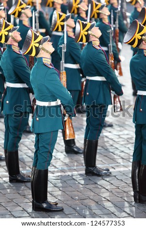 MOSCOW - AUGUST 31: Soldiers with guns of honor guard of Presidential Regiment at Military Music Festival Spasskaya Tower on August 31, 2011 in Moscow, Russia.