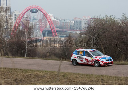 MOSCOW - APR 21: Skripnikov and Grechko in racing car on Rally Masters Show, on April 21, 2012 in Moscow, Russia