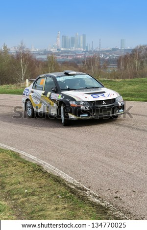 MOSCOW - APR 21: Tushkanova and Jankovskaja in racing car on Rally Masters Show, on April 21, 2012 in Moscow, Russia