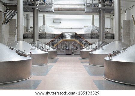MOSCOW - MAY 31: Large cisterns with hatchs in Ochakovo factory, on May 31, 2012 in Moscow, Russia. Ochakovo company has 18 enterprises.