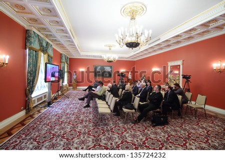 MOSCOW - APRIL 24: Newspapermen listen and write information on Enlarged meeting of Council in Grand Kremlin Palace on April 24, 2012 in Moscow, Russia.