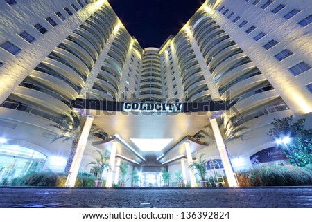 ALANYA - JULY 5: Goldcity hotel entrance at night, on July 5, 2012 in Alanya, Turkey. Five-star hotel Goldcity includes 120 rooms and 478 luxury apartments.