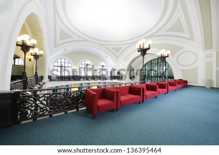 MOSCOW - MAY 23: Red couches in Commerce and Industrial chamber of Russia, May 23, 2012 Moscow, Russia. Congress center of Commerce and Industrial chamber has conference room of 370 square meters