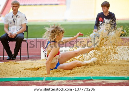 MOSCOW - JUN 11: Female jumper in sandpit at Grand Sports Arena of Luzhniki OC during International athletics competitions IAAF World Challenge Moscow Challenge, June 11, 2012, Moscow, Russia.
