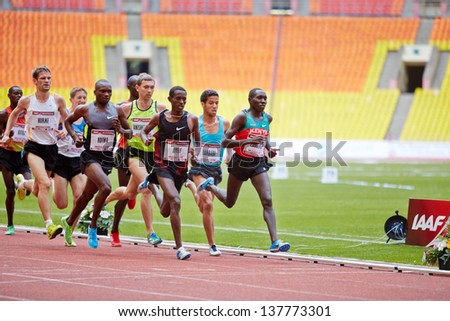 MOSCOW - JUN 11: Group of runners on race track at Grand Sports Arena of Luzhniki OC during International athletics competitions IAAF World Challenge Moscow Challenge, June 11, 2012, Moscow, Russia.