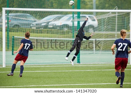 MOSCOW - AUG 23: Female goalkeeper returns ball over bar during opening match between CSP Izmailovo (Moscow) - Mordovochka (Saransk) , August 23, 2012, Moscow, Russia.