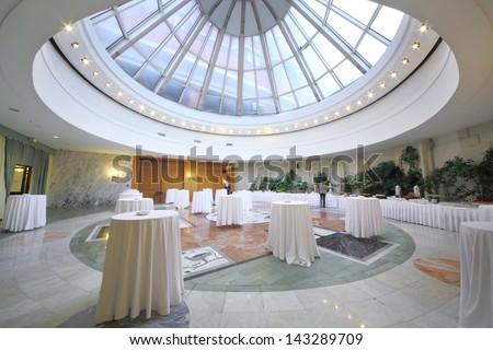 MOSCOW - NOV 21: Cocktail reception at the White Hall with glassy ceiling in the President Hotel, on Nov 21, 2012 in Moscow, Russia