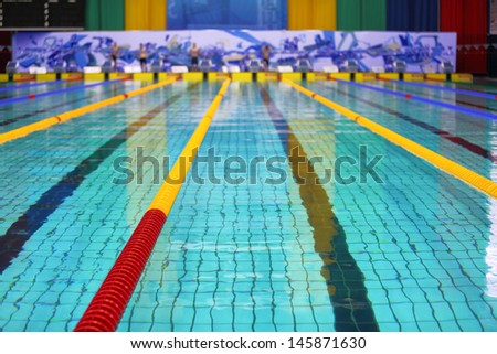 MOSCOW - APR 22: Olympic Sports complex, on April 22, 2012 in Moscow, Russia. An indoor swimming pool with many lanes  before competitions on swimming