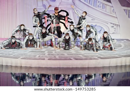MOSCOW - JAN 5: Spider team poses after performance of musical spectacle Through the Looking Glass in Swimming Pool of Sports complex Olympyisky, January 5, 2013, Moscow, Russia.