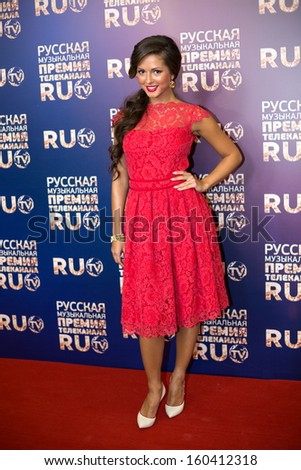 MOSCOW - MAY 25: Singer Nusha in red dress on Russian Music Award channel RUTV in Crocus City Hall on May 25, 2013 in Moscow, Russia.