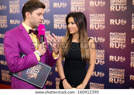 MOSCOW - MAY 25: Ani Lorak with presenter on Russian Music Award channel RUTV in Crocus City Hall on May 25, 2013 in Moscow, Russia.