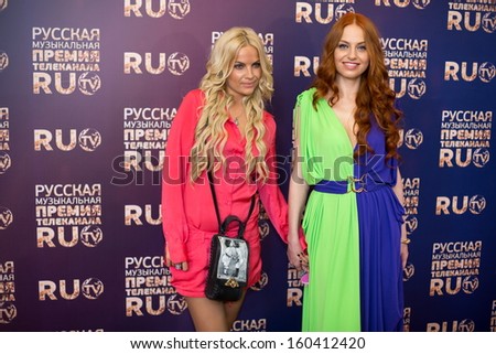 MOSCOW - MAY 25: Irina Zabiyaka with friend on Russian Music Award channel RUTV in Crocus City Hall on May 25, 2013 in Moscow, Russia.