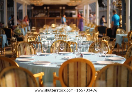 MOSCOW - AUG 13: Served table in floating Restaurant River Palace on August 13, 2013 in Moscow, Russia.