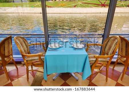 MOSCOW - AUG 13: View from the window of the floating Restaurant River Palace  on the water reflection on August 13, 2013 in Moscow, Russia.