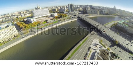 MOSCOW - OCT 12: Cityscape with White House, Novy Arbat and Bridge with car traffic over the river (unmanned drone view) on October 12, 2013 in Moscow, Russia.