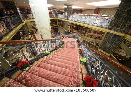 RUSSIA, MOSCOW - DEC 11, 2013: Staircase with ornate carpet in the hall of Lotte Plaza Hotel.