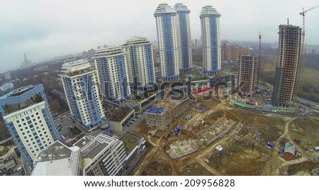 MOSCOW, RUSSIA - NOV 22, 2013: Construction of residential complex Dolina Setun near the apartment complex Vorobyovy Gory, aerial view. Complex located on the right bank of the Moskva River