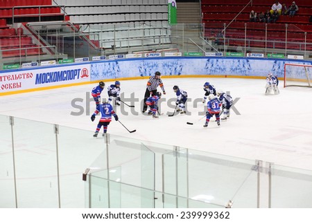 MOSCOW, RUSSIA - APR 26, 2014: Teams of children playing hockey at the Ice Palace of Sports Sokolniki