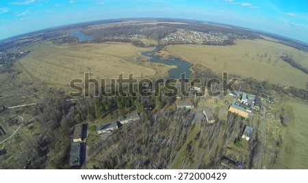 Landscape with health camp for children and field in the spring day, aerial view